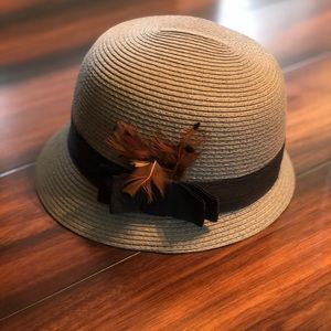 Gray Cloche Hat with Black Ribbon and Feathers